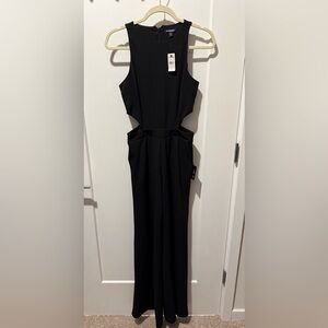 Express Woman’s Sleeveless Black Jumpsuit With Cutouts & Wide Leg. Size S New.